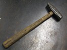 Photo of a cross-peen hammer.