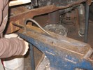 The hold-down works by being hammered into the pritchel hole, so it wedges down against the workpiece.