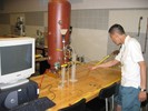 Lab 4 apparatus: computer for instrumentation and data capture, air storage tank, pipe with bend that collects water.