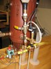 Detail view of solenoid valve and water entry.