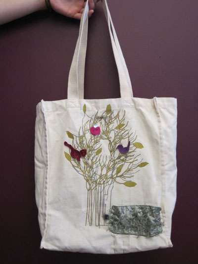Photo of a canvas bag with tree design.
