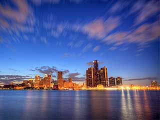 A photo of Detroit, Michigan, taken at sunset from the river.