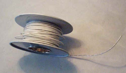 Spool of white wire.