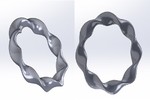 A computer generated image of a twisted bracelet.